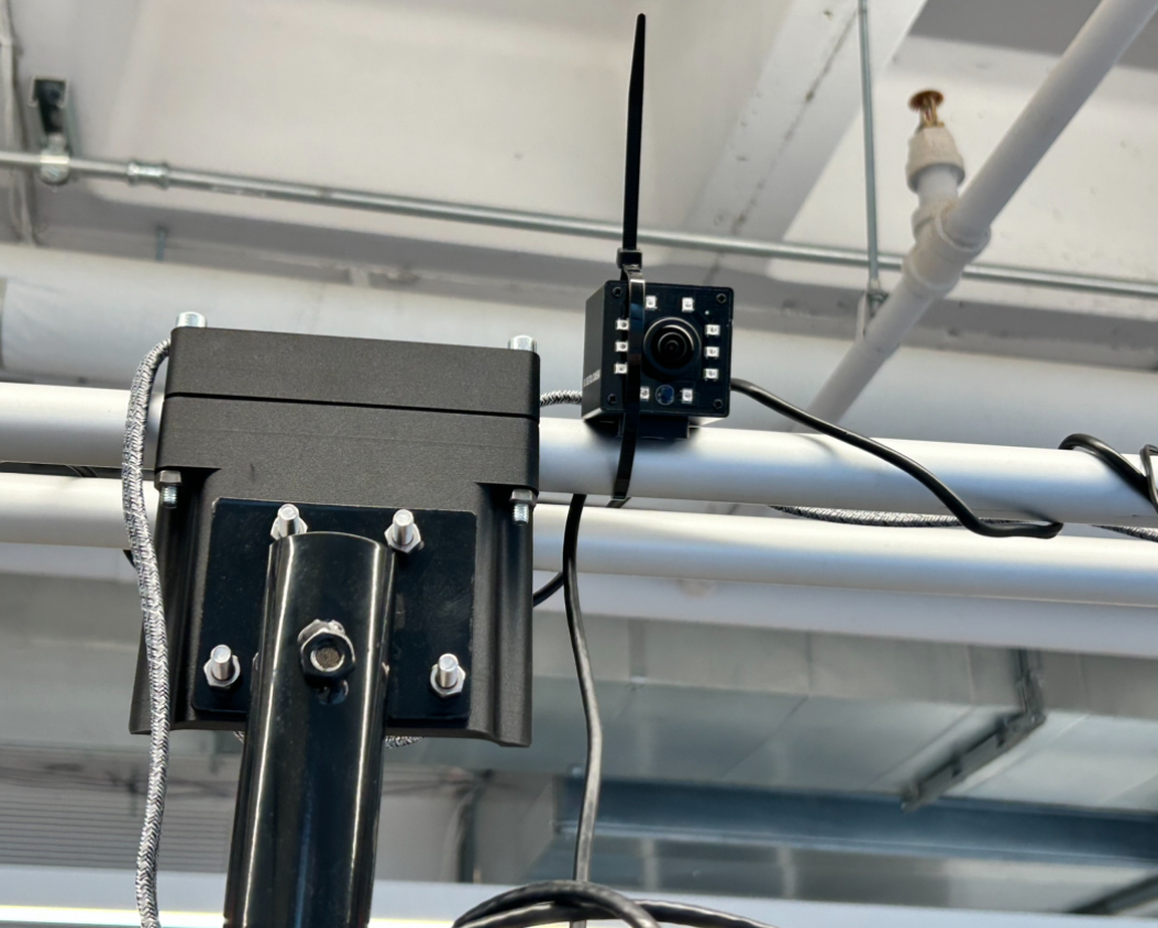 Camera hanging up in office.